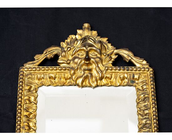 Pair of antique "Ventoline" mirrors, Napoleon III style, in gilded and chiseled bronze. France, 19th century.