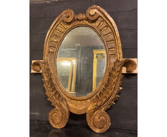 SPECC558 - Oval lacquered and gilded mirror, '7/'800 period, measures cm W 105 x H 207