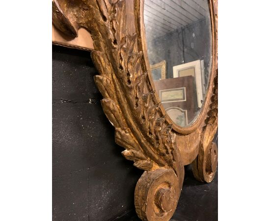 SPECC558 - Oval lacquered and gilded mirror, '7/'800 period, measures cm W 105 x H 207