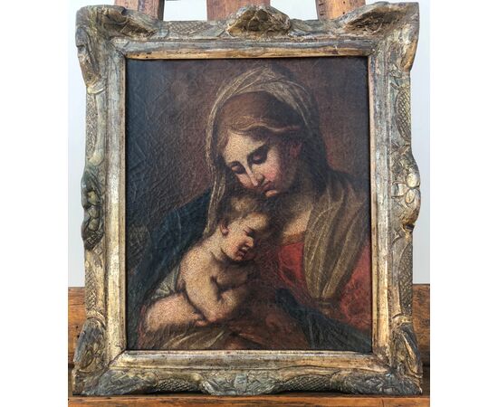 Dipinto olio su tela raffigurante Madonna con Gesu’Bambino.Scuola emiliana.