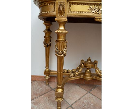 Antique Napoleon III console table in gilded and carved wood with a white marble top. France, 19th century.