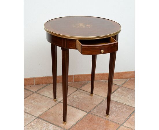 Antique Napoleon III mahogany side table with gilded bronze inserts. France, 19th century.