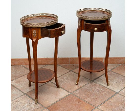 Pair of antique side tables in precious exotic woods with inlays of gilded bronze elements. France, early 20th century.