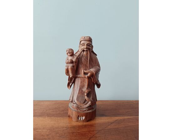 Personaggi orientali in legno
