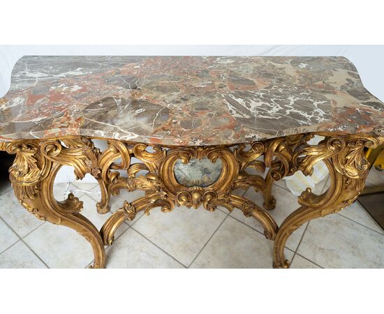 Consolle antica Napoleone III in legno dorato e intagliato con piano in marmo. Francia XIX secolo.