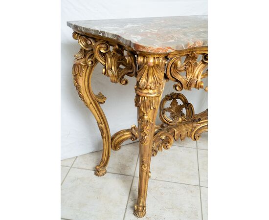 Consolle antica Napoleone III in legno dorato e intagliato con piano in marmo. Francia XIX secolo.