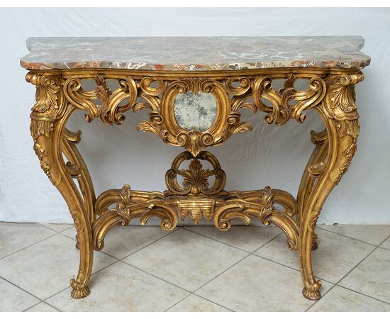 Consolle antica Napoleone III in legno dorato e intagliato con piano in marmo. Francia XIX secolo.