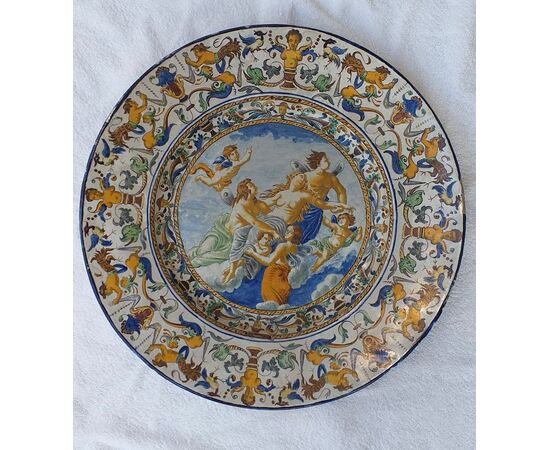 Large parade plate decorated with grotesques with mythological scene.Mollica manufacture.Naples.     