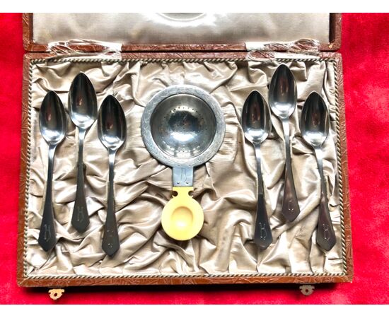 Set of six silver teaspoons with silver and ivory tea strainer. Original box Austria     