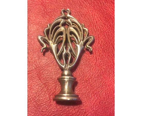 Silver seal with openwork vegetable motif in art nouveau style.     