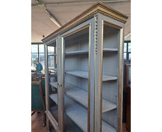 Libreria a 4 porte laccata e dorata con rete