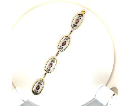 BRACCIALE SEMIRIGIDO IN ORO ARGENTO RUBINI E DIAMANTI