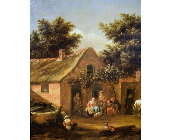 Personaggi e cavalieri nel cortile dell'osteria.