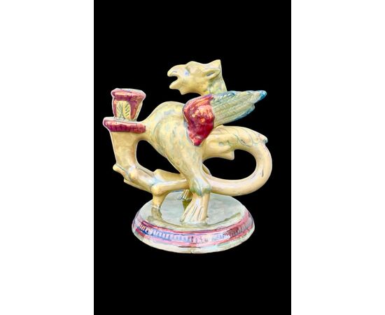 Candeliere - bugia in maiolica a lustro a forma di grifone alato.Societa’Ceramica Umbra.Gualdo Tadino.