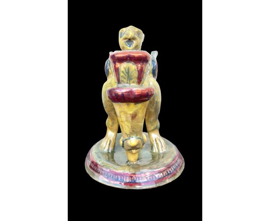 Candeliere - bugia in maiolica a lustro a forma di grifone alato.Societa’Ceramica Umbra.Gualdo Tadino.