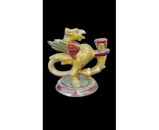 Candeliere - bugia in maiolica a lustro a forma di grifone alato.Societa’Ceramica Umbra.Gualdo Tadino.