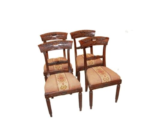 Set of 4 French Empire style chairs with richly carved backrests