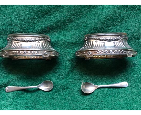 Pair of silver salt cellars with Empire geometric and floral motifs. France.     