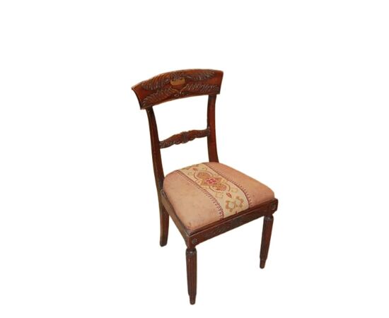 Set of 4 French Empire style chairs with richly carved backrests