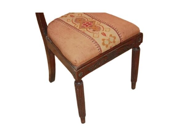 Set of 4 French Empire style chairs with richly carved backrests
