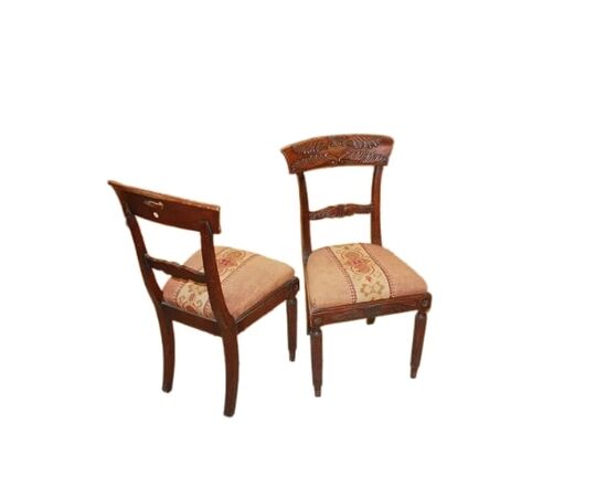 Set of 4 French Empire style chairs with richly carved backrests