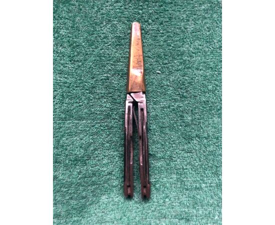 Small scissor with two folding knives. Handle covered in tortoiseshell.     