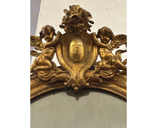 Specchiera lombarda ovale legno intagliato dorato. Primi 800. 155 x 98
