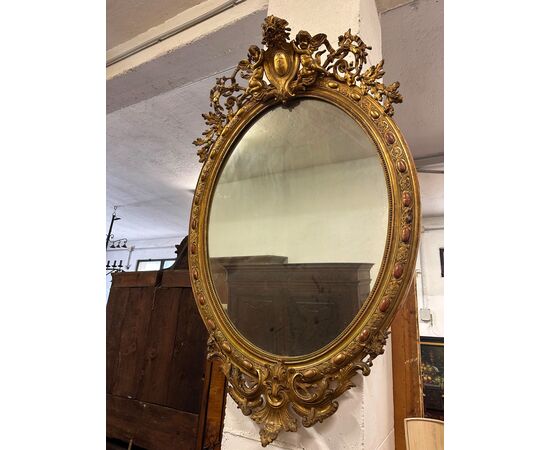 Specchiera lombarda ovale legno intagliato dorato. Primi 800. 155 x 98