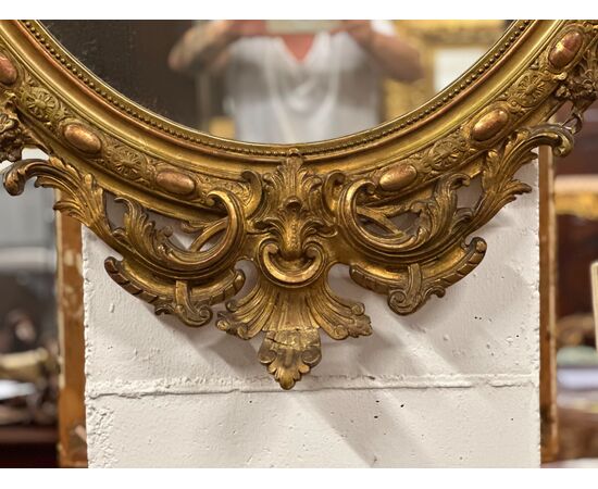 Specchiera lombarda ovale legno intagliato dorato. Primi 800. 155 x 98
