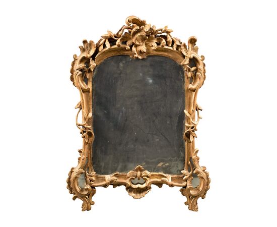 Specchierina in legno intagliato e dorato. Venezia, XVIII secolo.