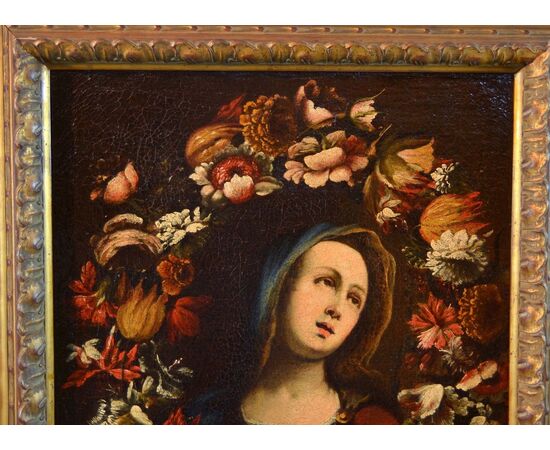 Ghirlanda di fiori con ritratto della Vergine
