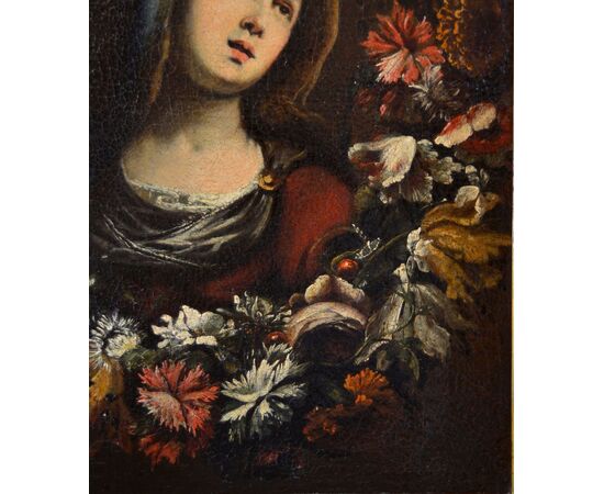 Ghirlanda di fiori con ritratto della Vergine