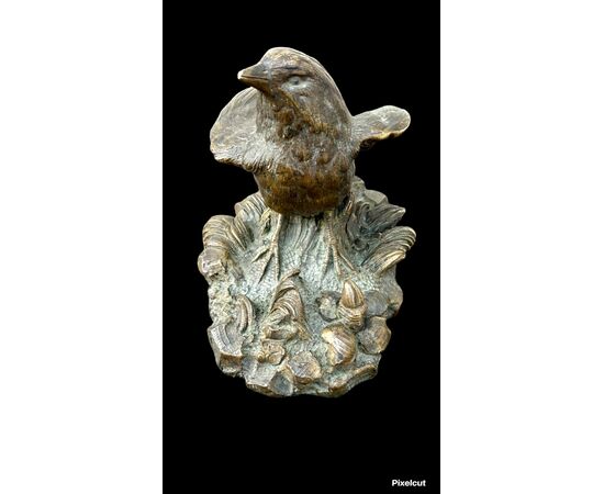 Sculturina in bronzo raffigurante un uccellino