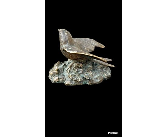 Sculturina in bronzo raffigurante un uccellino