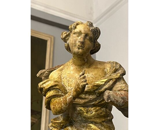 Scultura in legno intagliato e dorato 