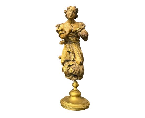 Scultura in legno intagliato e dorato 