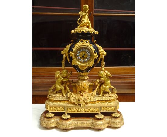 Orologio in bronzo dorato e porcellana 1870 Napoleone III Francia