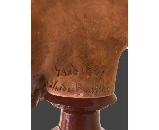 Terracotta sculpture signed "DOM.VAN DEN BOSSCHE"