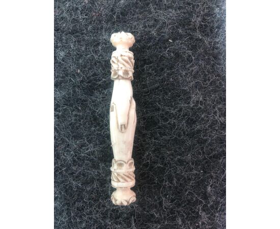 Ivory needle case with hands, Europe.