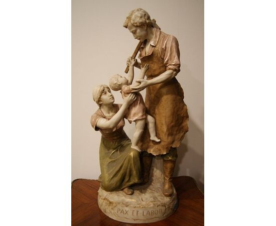 Antique large Royal Dux Bohemia porcelain sculpture from the 1800s depicting a traditional family