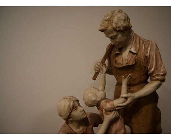 Antique large Royal Dux Bohemia porcelain sculpture from the 1800s depicting a traditional family