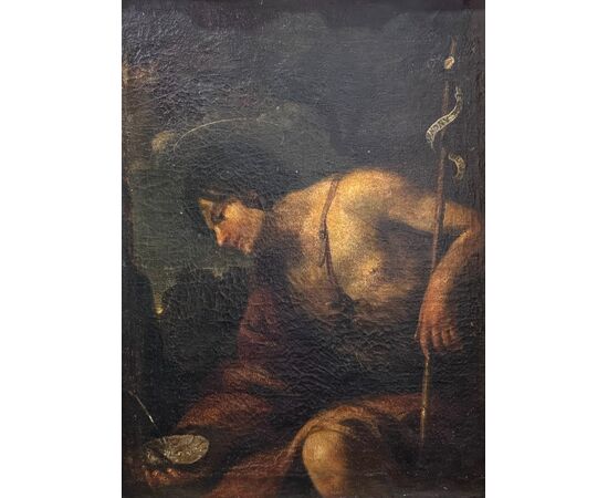 Saint John the Baptist in the desert, an oil painting on canvas from the 17th century.