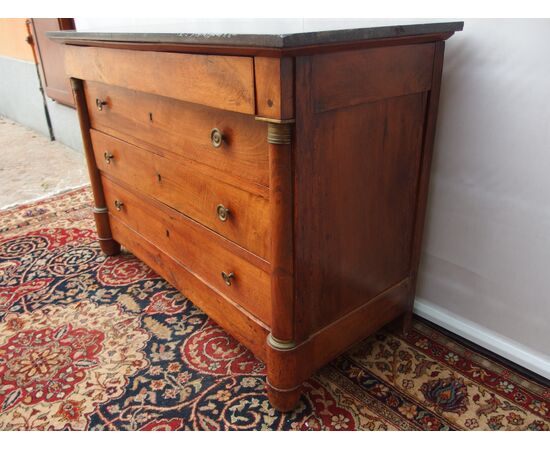 Empire style walnut chest of drawers with black marble, 19th century