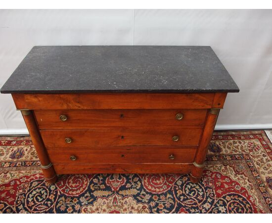 Empire style walnut chest of drawers with black marble, 19th century