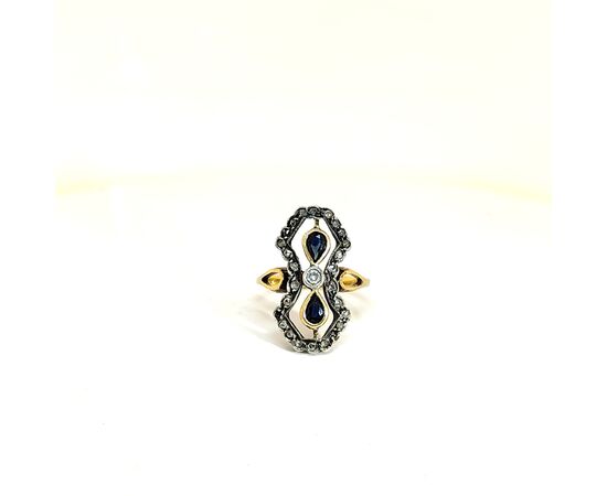 Anello in oro con zaffiri e diamanti