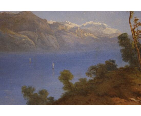 Antique English painting from the 1800s, oil on canvas, depicting a mountain landscape with a lake.