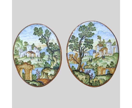 Pair of Castelli oval plaques, 19th century