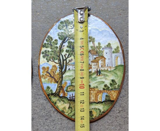 Pair of Castelli oval plaques, 19th century