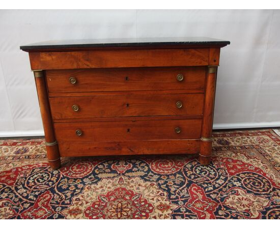 Empire style walnut chest of drawers with black marble, 19th century