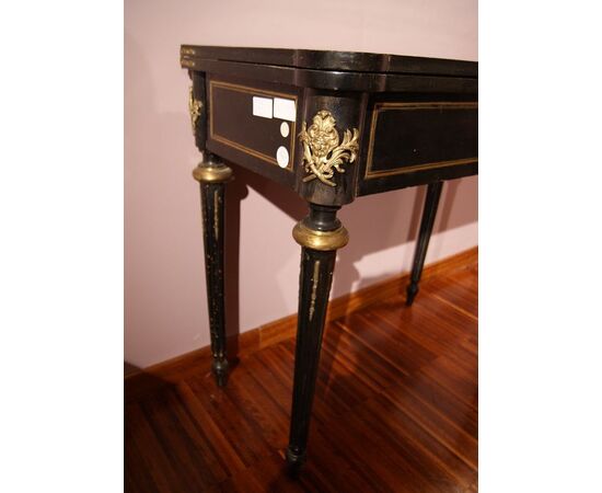 Antique French Boulle style game table from the 1800s in ebonized wood with brass inlays and bronzes